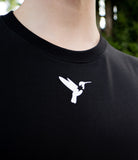 Close-up Bird of Thunder logo on black T-shirt