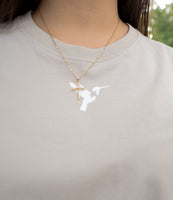Close-up Bird of Thunder logo on desert t-shirt
